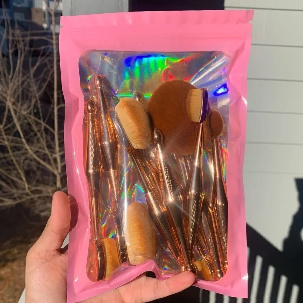 10 piece Rose gold mermaid style paddle oval brush set